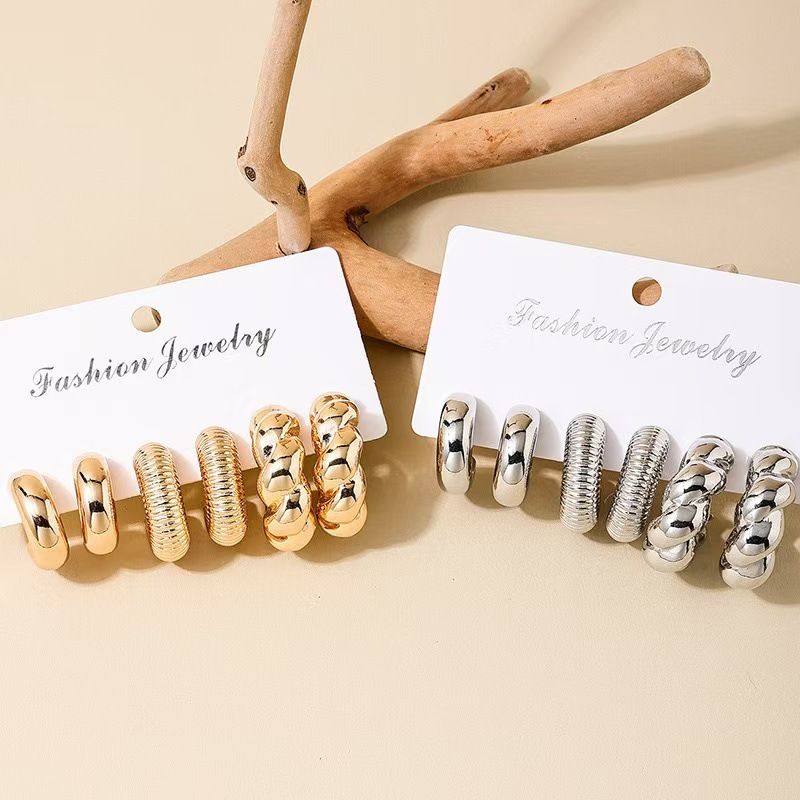 Unisex gold classic fashion personality C shaped twisted water drop shaped women's earrings set_voghion.com