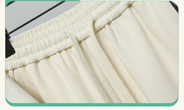 Chándal con cremallera para el invierno: bloques de color en contraste y estampado de letras llamativas (negro/marfil)_voghion.com