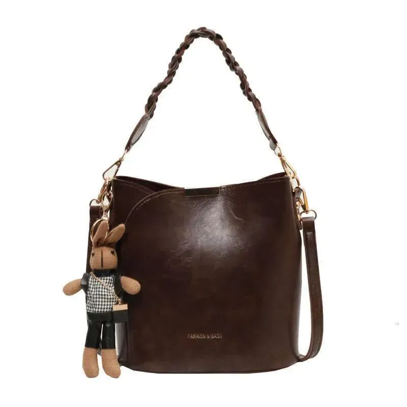 Borsa da donna vintage con design di nicchia2025nuova borsa a tracolla versatile con texture avanzata, popolare e portatile_voghion.com