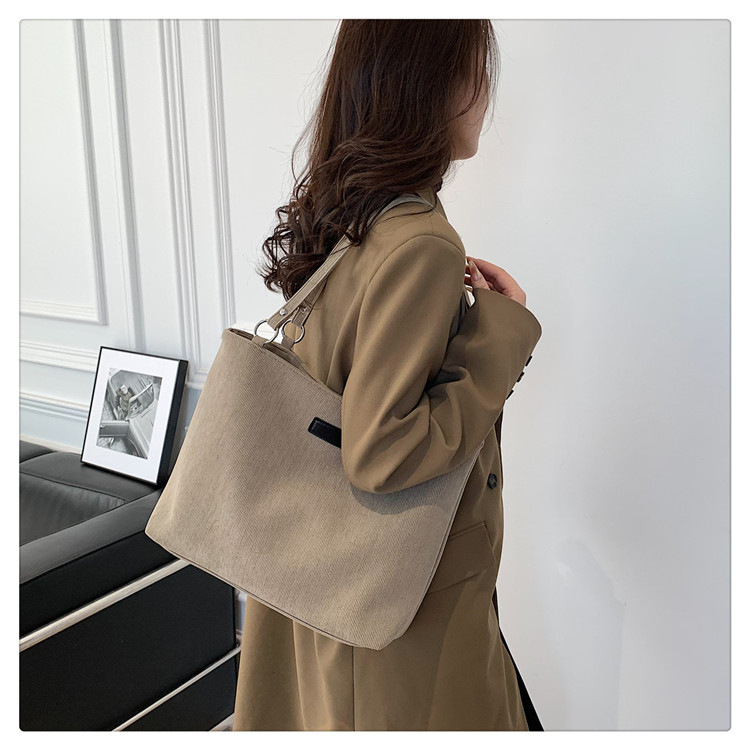 Canvas multifunctional bag women's simple and versatile commuter shoulder bag large capacity fashion tote bag_voghion.com