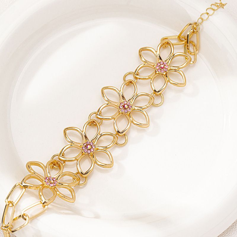 Bracciale da donna con diamanti incastonati, in metallo, con fiore cavo, semplice e alla moda, 1 pezzo_voghion.com