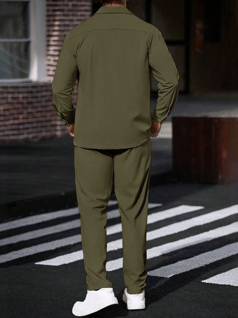 Completo sportivo casual da uomo in due pezzi con semplice giacca con risvolto, tasca con bottoni e pantaloni dritti_voghion.com