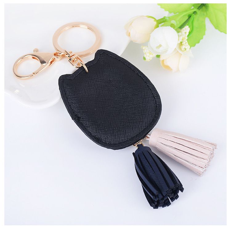 Portachiavi per auto con nappa a forma di testa di gatto in pelle, stile creativo, ciondolo per borsa da donna_voghion.com