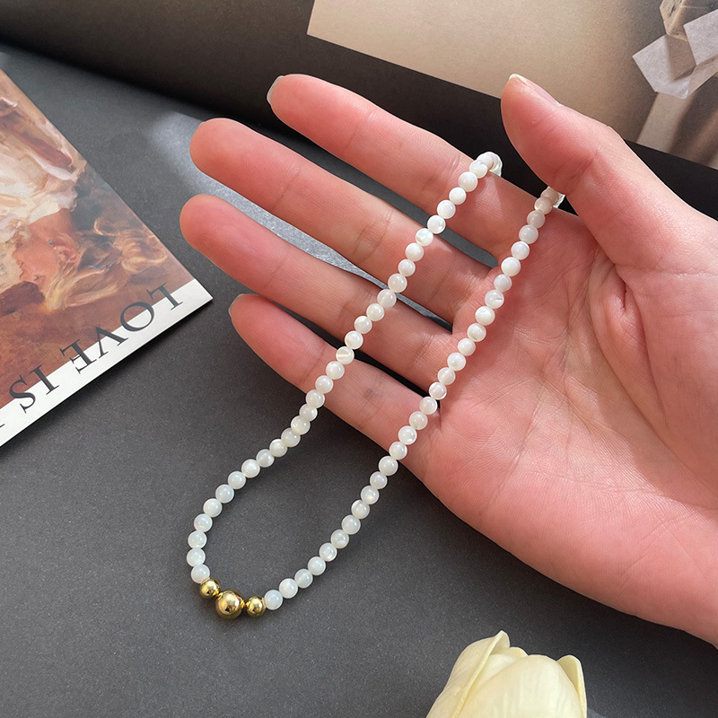 Nuova collana coreana di perline di fagioli d'oro dal design di nicchia coreana per donna, collana a catena di clavicola di fascia alta, semplice, versatile_voghion.com