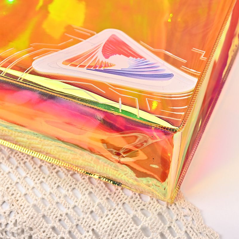 Straight color PVC laser bag for women's clothing store, fashionable high-end shopping handbag_voghion.com