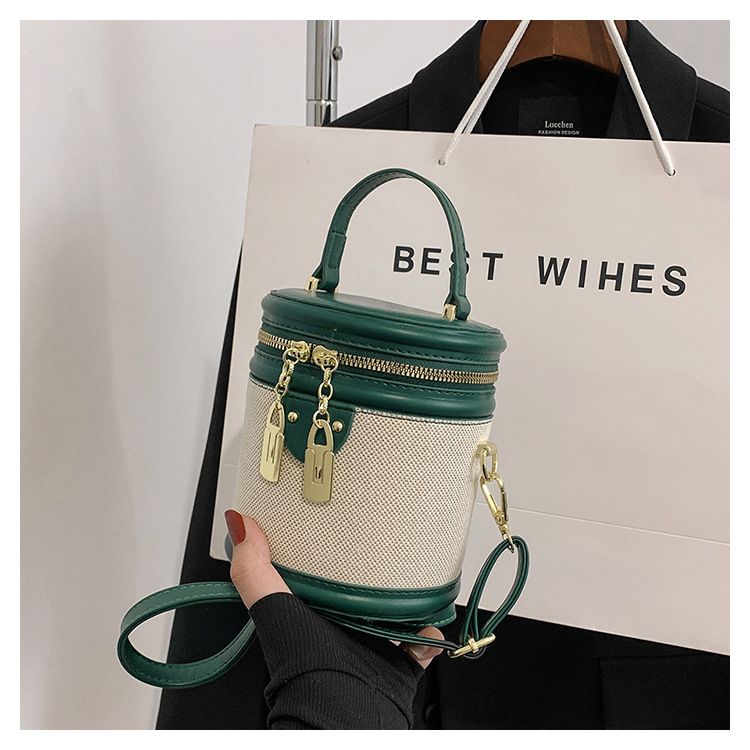 2024 New Retro Bucket Bag for Women's Handheld Fashion Contrast Color Cylinder Bag with High Appearance and Exquisite One Shoulder Crossbody Bag_voghion.com