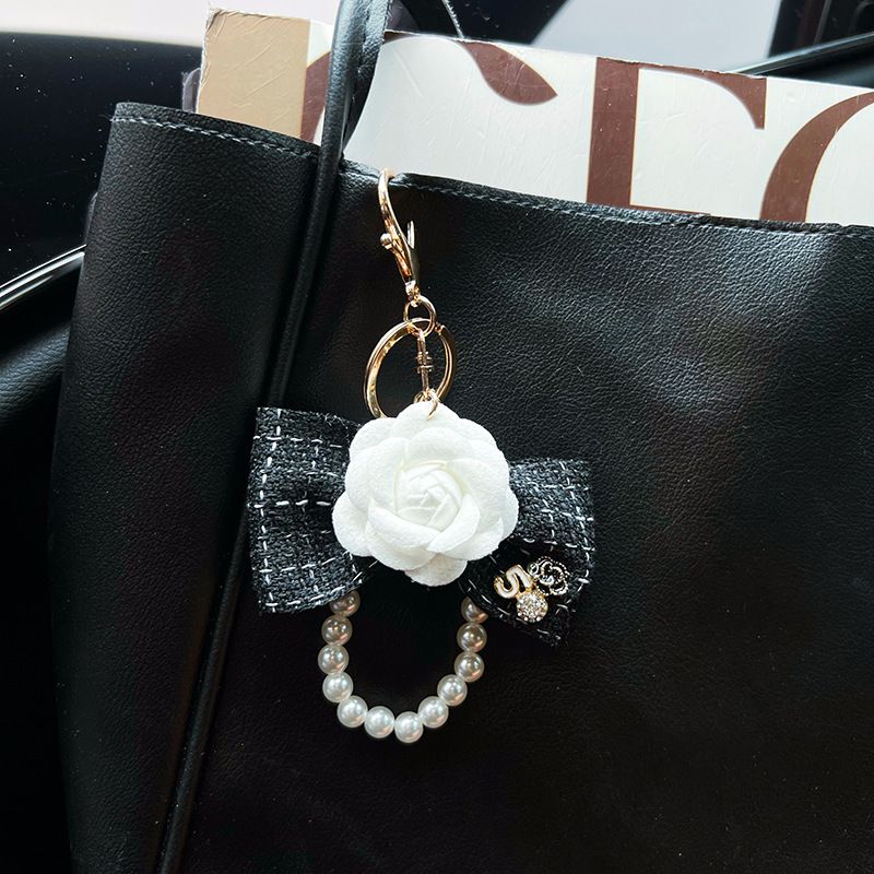 Personalized pearl chain, small fragrance bow, camellia creative and exquisite car keychain, bag decoration, female_voghion.com