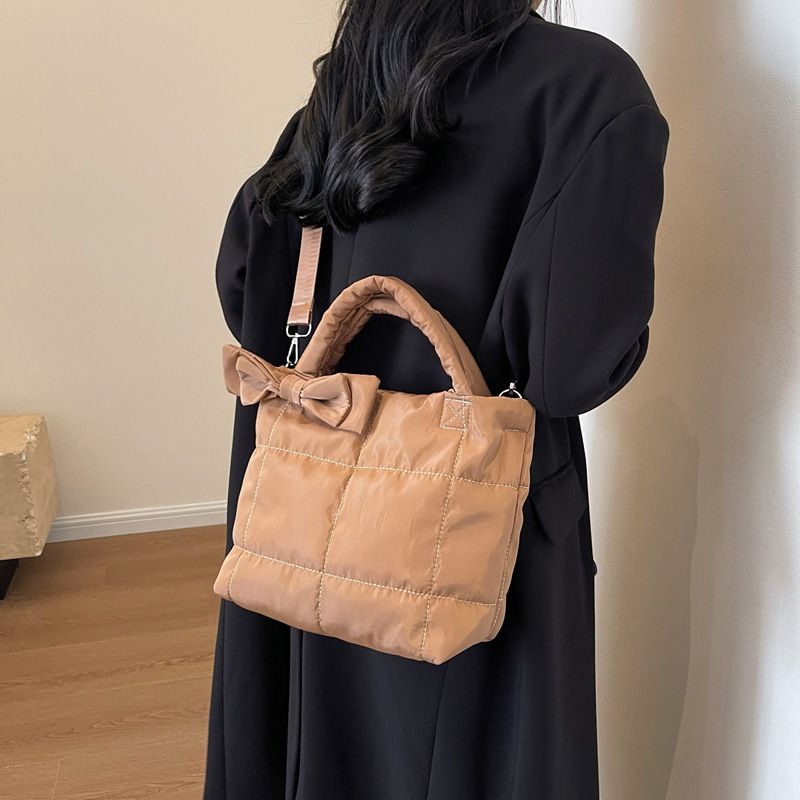 Autumn and winter women's down new cute bow single shoulder handbag space cotton temperament crossbody bag_voghion.com