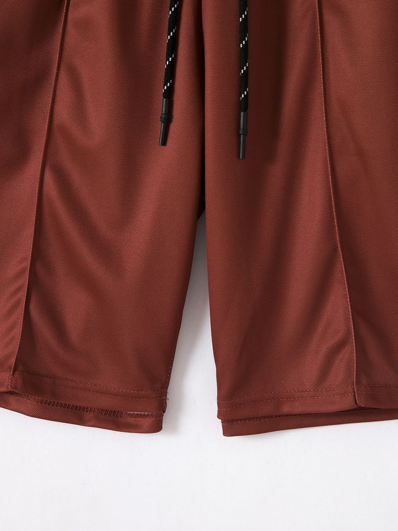 Completo casual da uomo in 2 pezzi - Completo con camicia a maniche corte con cerniera e pantaloncini coordinati | Design alla moda a blocchi di colore_voghion.com