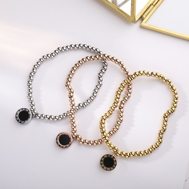 Bracciale elastico in acciaio al titanio con numeri romani, bianco e nero, in oro rosa, accessori creativi per donna_voghion.com