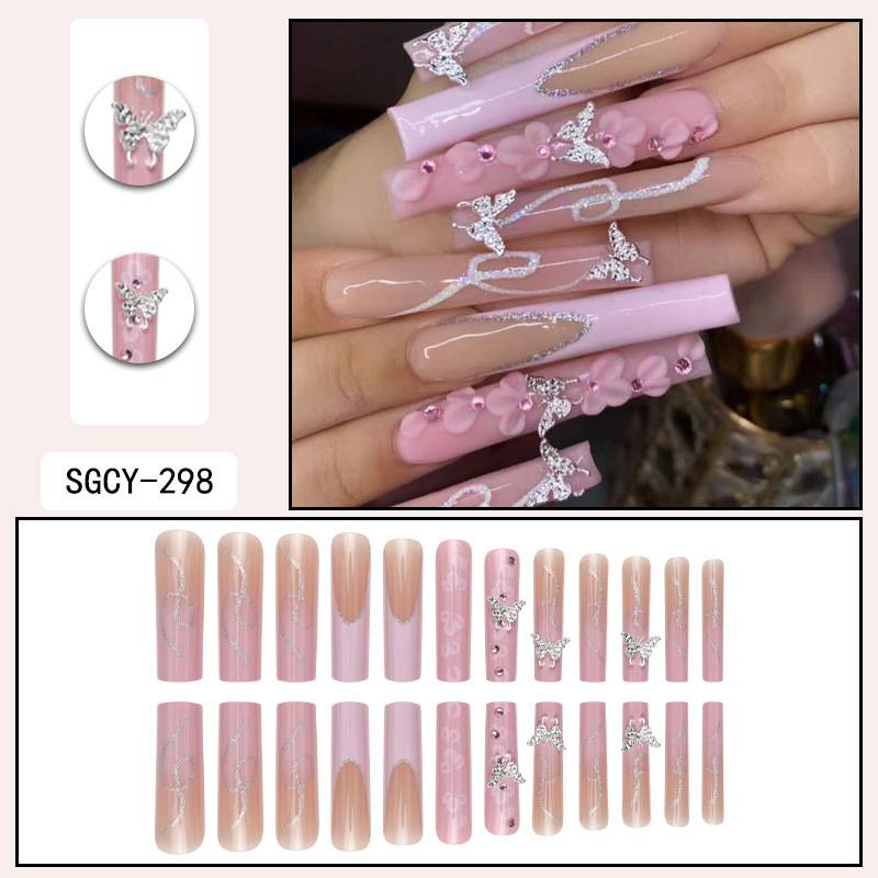 Eleganti unghie finte con farfalle argentate e motivo floreale rosa - Unghie finte glitterate con strass - Facili da applicare_voghion.com