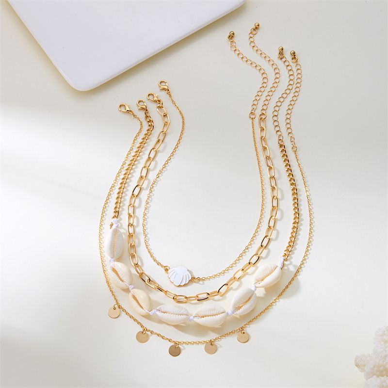 Ensemble de bijoux pour femme : collier multicouche en coquillage, perle et conque, style rétro estival, avec pendentif étoile de mer._voghion.com
