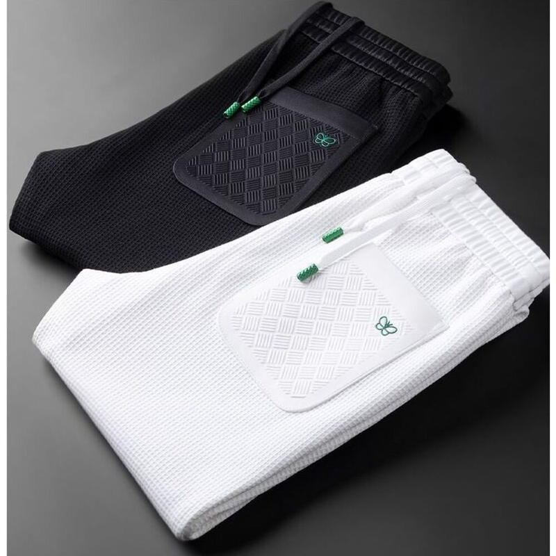 Pantaloni bianchi a quadri waffle leggeri di lusso alla moda europea per uomo, vestibilità slim e casual morbidi, primavera e autunno_voghion.com