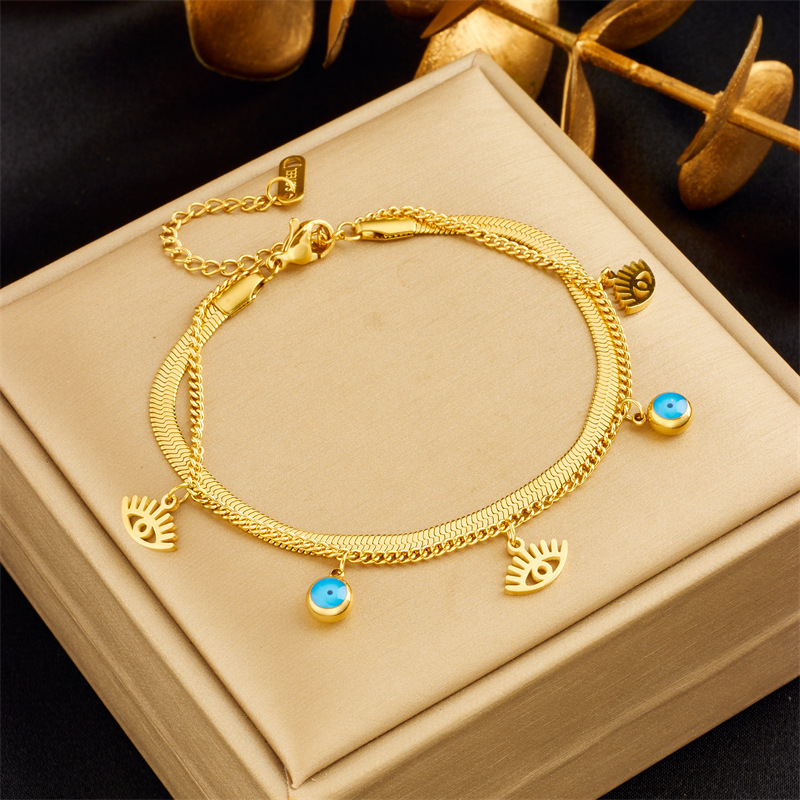 European and American fashion niche retro high-end double-layer stacking diamond round blue eye star lightning pendant bracelet_voghion.com