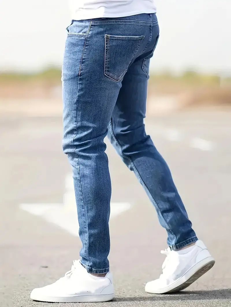 Herenkleding 2025 Europese en Amerikaanse mode Grensoverschrijdende Europese en Amerikaanse heren Small Foot Stretch Ripped Jeans Strakke herenjeans_voghion.com
