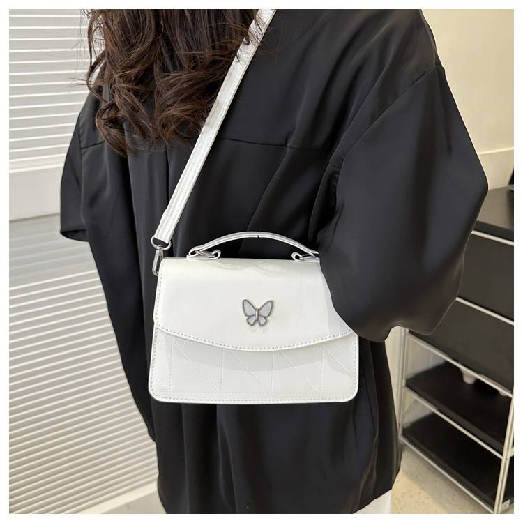 Fransk lyxig handväska i mild stil Butterfly Dekorativ liten väska Dam 2024 Sommar Ny västerländsk stil Crossbody-väska med en axel_voghion.com