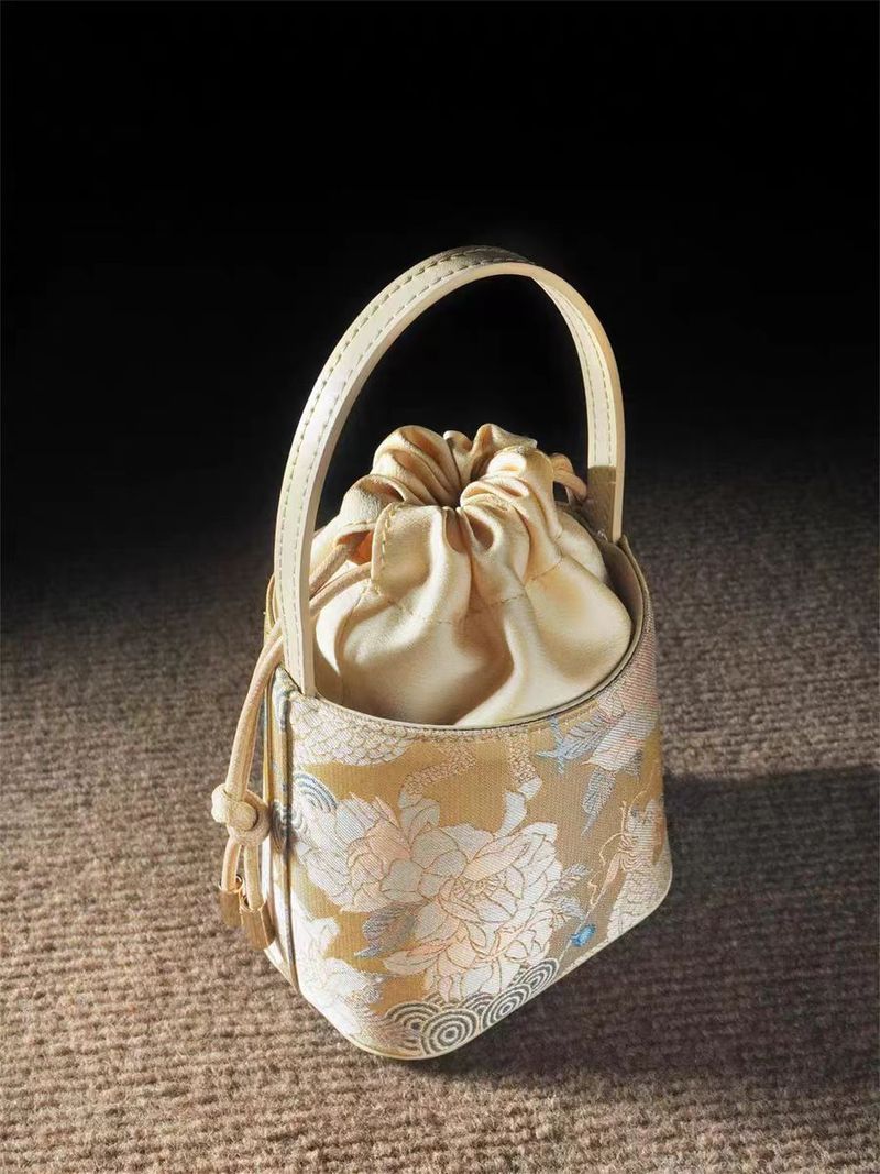 Borsa a secchiello portatile da donna in stile nazionale cinese Kirin Peony, mini 2025_voghion.com