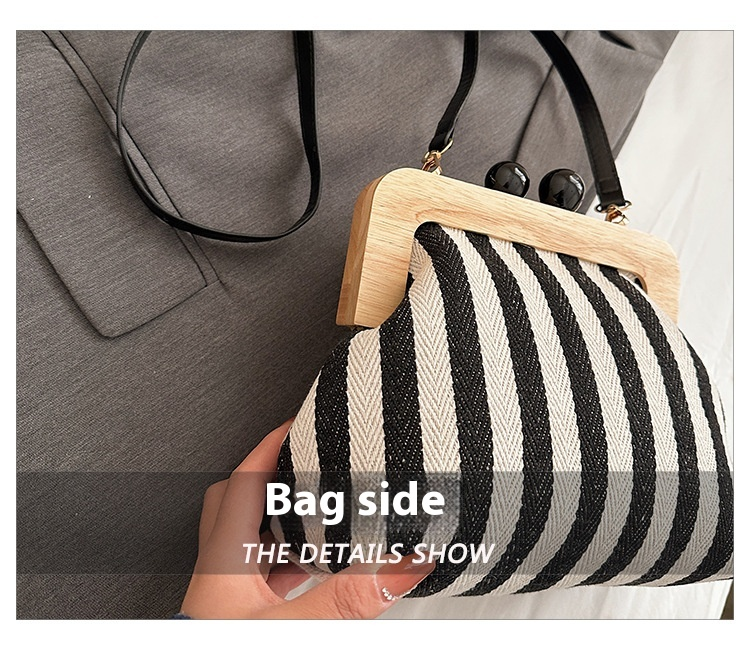 2024 Borsa da donna nuova Borsa a tracolla in tela con clip in legno a righe Borsa a tracolla con una spalla alla moda e raffinata_voghion.com
