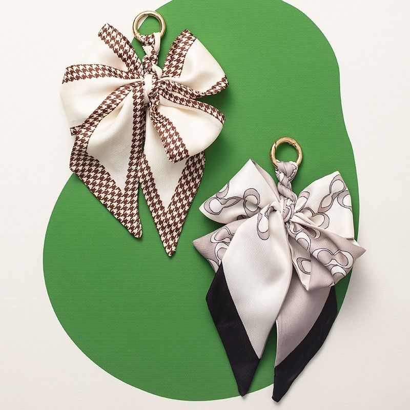 2025 Autumn And Winter Fashion Bag Accessories Keychain Woven Bag Pendant Decorative Bow Bag Pendant Versatile High Sense Retro_voghion.com