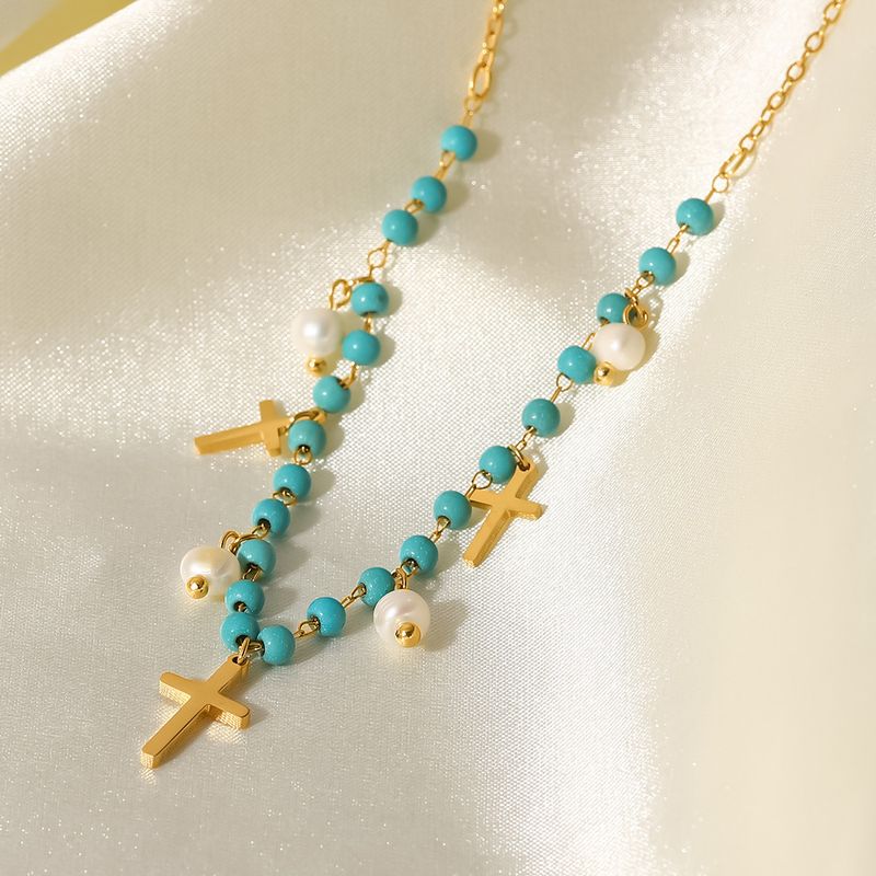 Francês Novo Popular Feminino Azul Pedra Arroz Cruz Pérola de Água Doce Colar Pingente Borla_voghion.com
