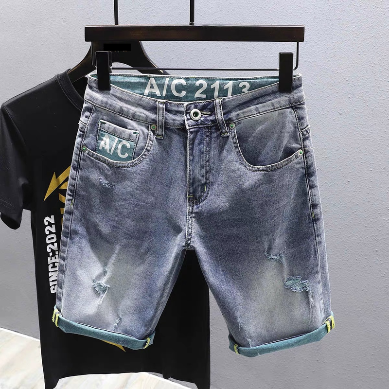 Herrenbekleidung Sommer Neue Herren Trend Helle Farbe Jeans Shorts Zerrissene Mode Lose Shorts Männer_voghion.com