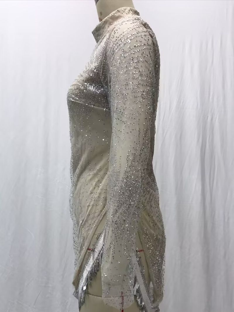 Abito da sera sexy a maniche lunghe con spacchi di nappe in oro e argento, da donna_voghion.com