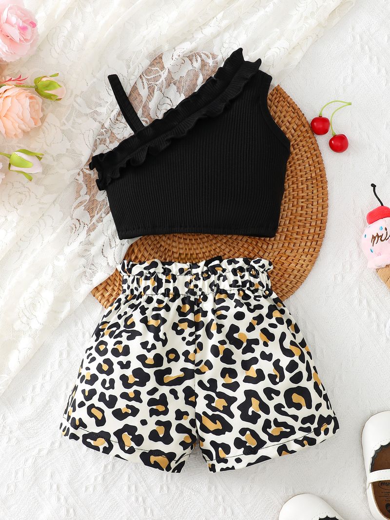 Esclusivamente per i nuovi arrivi transfrontalieri, set di top e pantaloncini con stampa leopardata per neonata, in tinta unita e molto venduto._voghion.com