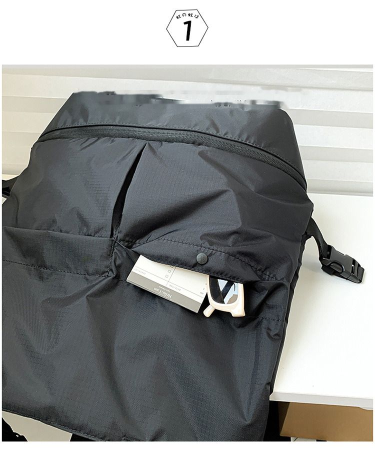 Zaino per uomini e donne Borse da trasporto per pendolari Borsa a spalla singola tinta unita Zaino in nylon antispruzzo di grande capacità Alla moda_voghion.com