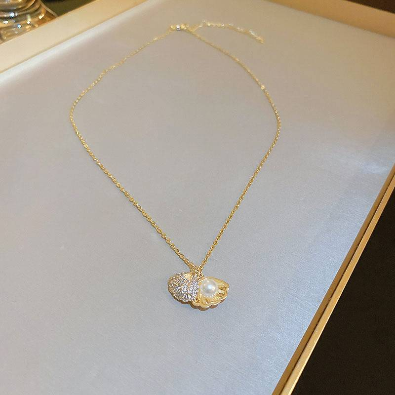 Collana di perle di conchiglia di alta qualità per le donne, semplice catena per clavicola, gioielli con ciondolo leggeri, lussuosi, versatili e personalizzati_voghion.com