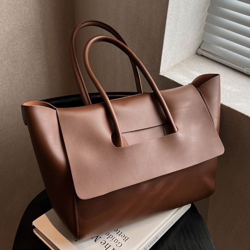 Große 2025S Designer High-End Big Bag Damentasche Neue trendige koreanische Version der Handtasche mit großer Kapazität Retro Pendlertasche Messenger Bag_voghion.com