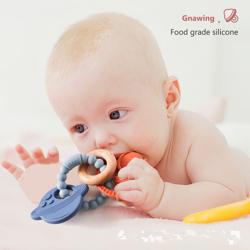 Baby Handgräifspillsaach Zännklebstoff Silikon Biss Musek Armband Baby Anti-Iess Hand berouegend Zännknäiper Zännklebstoff Spillsaach_voghion.com