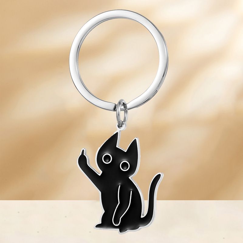 Portachiavi a forma di gattino scontento, divertente, in acciaio inossidabile, con ciondolo a forma di gatto nero con dito medio verticale._voghion.com