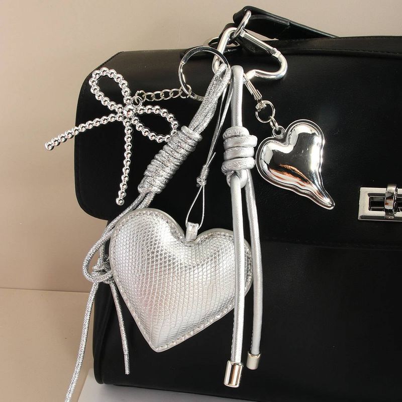 Portachiavi con fiocco a forma di cuore in PU argento di lusso - Accessorio alla moda per borse e portafogli, regalo perfetto per donne e ragazze_voghion.com