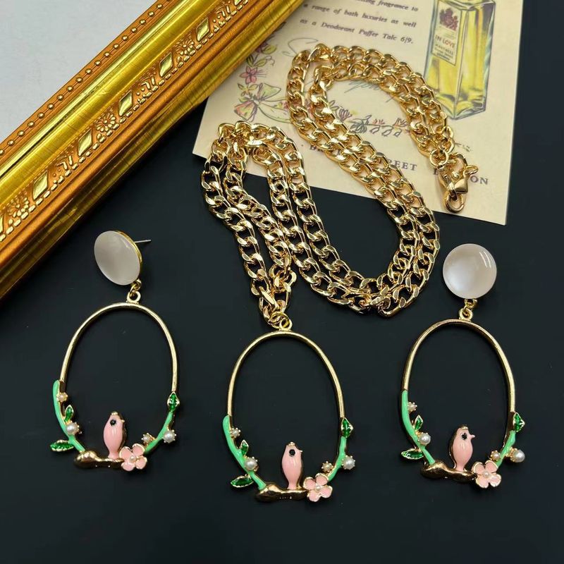 Collana con orecchini e ciondoli alla moda geometrici francesi in lega smaltata a forma di gabbia per uccelli vintage di Qingdao_voghion.com