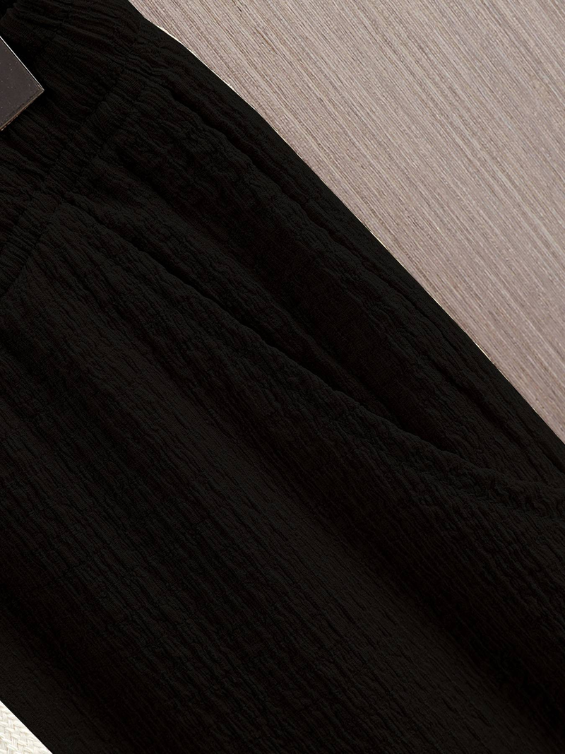 Un nuovo completo sportivo casual estivo da uomo europeo e americano con maniche corte e pantaloni lunghi in tinta unita, composto da due pezzi._voghion.com
