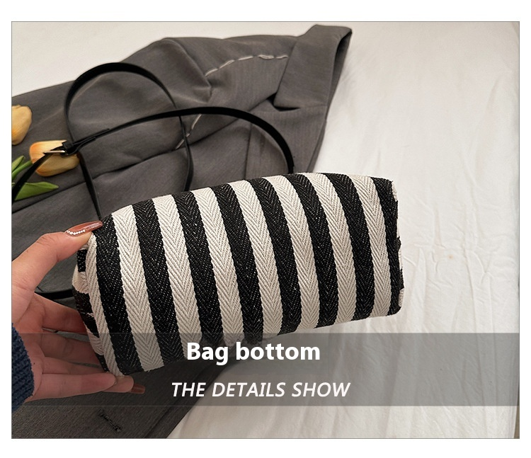 2024 Borsa da donna nuova Borsa a tracolla in tela con clip in legno a righe Borsa a tracolla con una spalla alla moda e raffinata_voghion.com