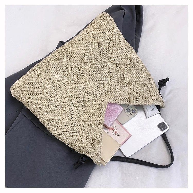 Niche Design 2025 High-End Hollow Shoulder Lazy Style Handheld Straw Vacation Beach Bag For Women_voghion.com