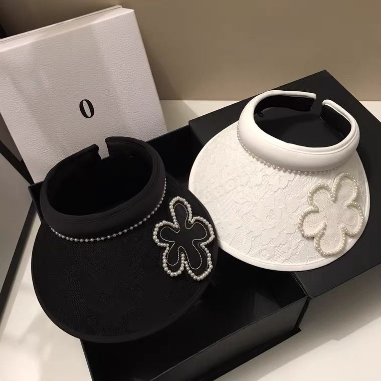 Top vuoto in stile forcina in pizzo jacquard coreano per viaggi estivi, parasole leggero con fiori di perle che riduce l'età e sole_voghion.com