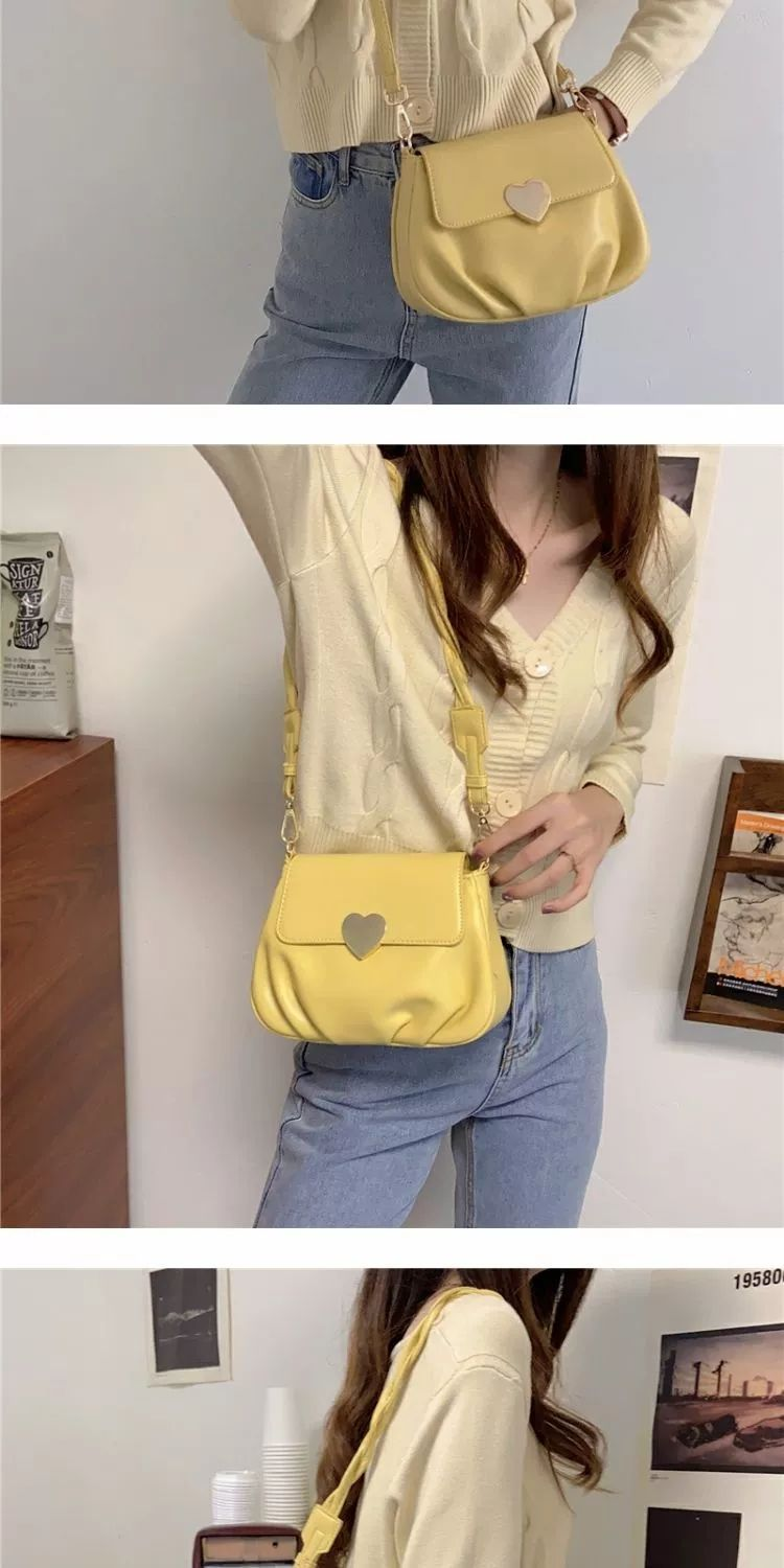 Borsa rotonda piccola pieghettata con fibbia a cuore pesca in morbida pelle da donna di design 2021 Nuova moda monospalla_voghion.com