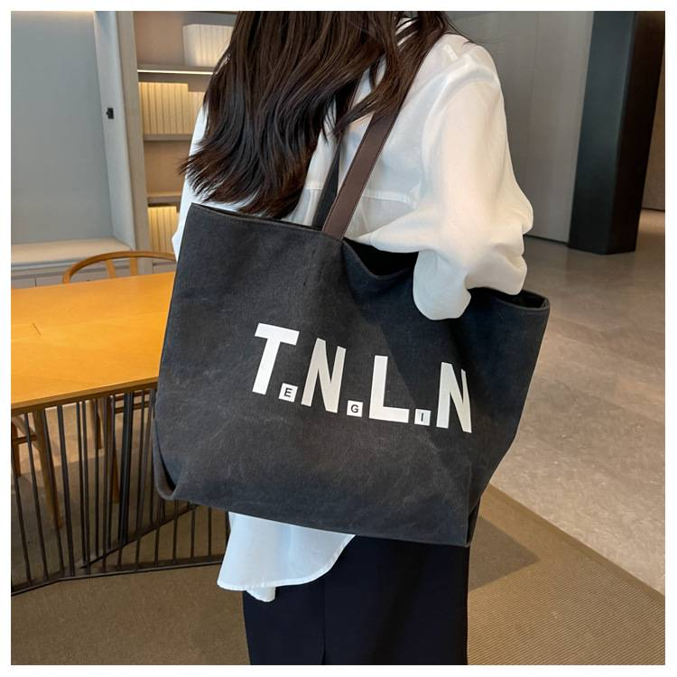 Bolsa de lona de grande capacidade feminina nova cor sólida bolsa de ombro casual versátil sacola estudante universitário classe sacos de deslocamento_voghion.com