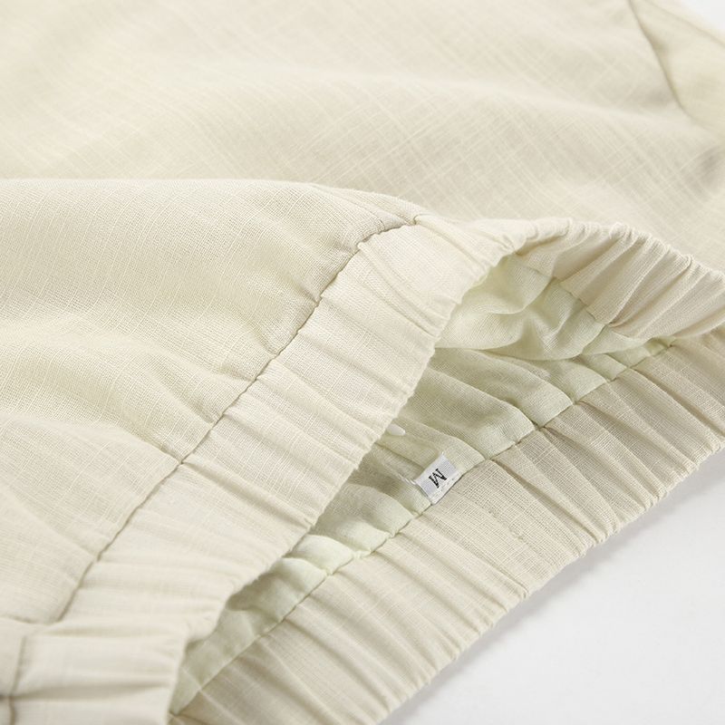 Traje informal de dos piezas de estilo europeo y americano, con cuello en V, sin mangas, de algodón y lino, color caqui francés, 2025_voghion.com
