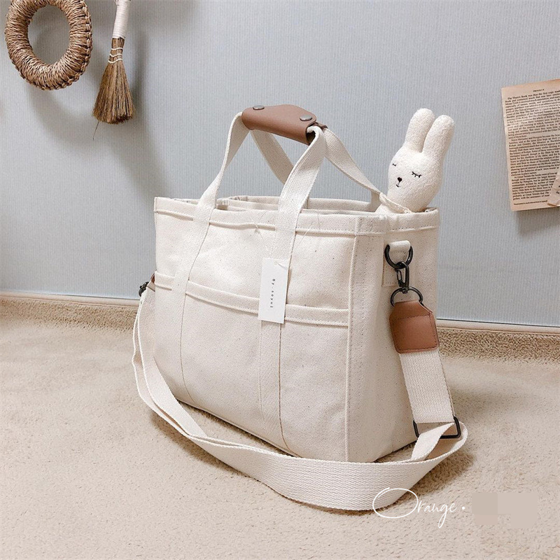 Multi-functional Convenient Shoulder Crossbody Portable Canvas Mother And Baby Stroller Hanging Bag_voghion.com