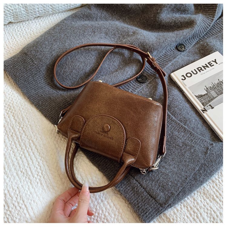 Hih end pleated texture handba for women 2024 niche desin draon bas Xian commutin crossbody versatile shoulder_voghion.com