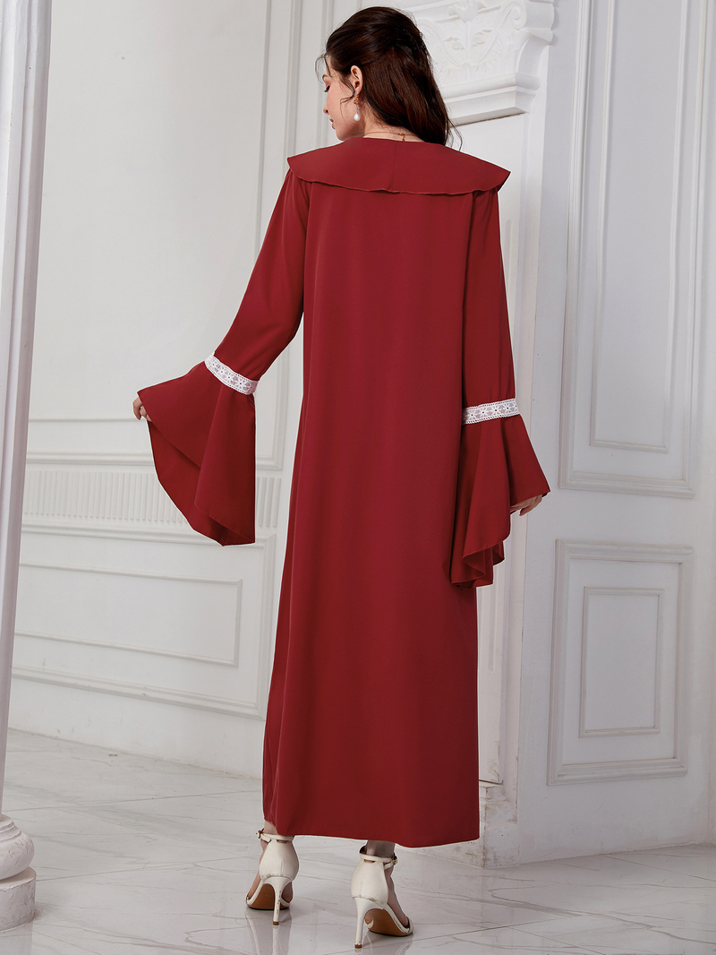 Abito da donna ricamato con scollo a V e maniche svasate_voghion.com