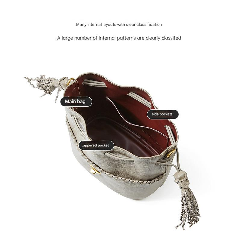 KOSE High-grade First-layer Cowhide Bucket Bag New Genuine Leather Women's Bag Tassel Niche Drawstring Shoulder Messenger Bag_voghion.com