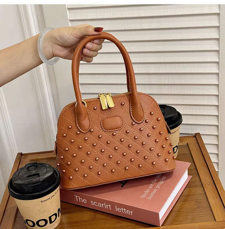 Fashion Designer Shell Bags For Women Elegant Rivet Handbag Versatile Large Capacity Shoulder Crossbody Bag_voghion.com