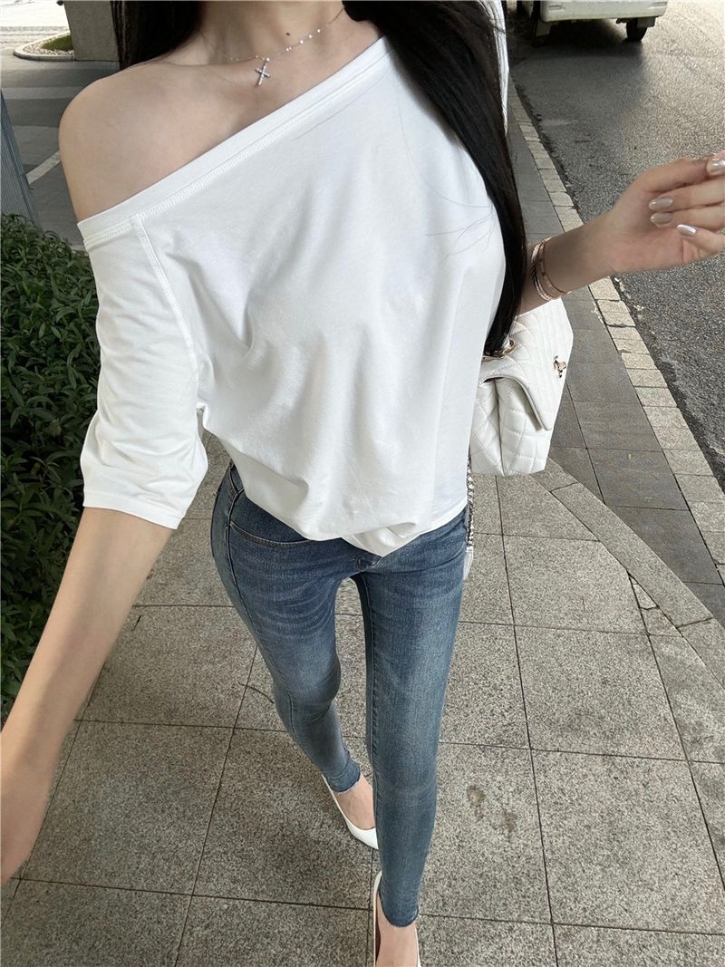 T-shirt ample à manches courtes et épaules obliques pour femme, haut décontracté, irrégulier, couleur unie, polyvalent, été 2025_voghion.com