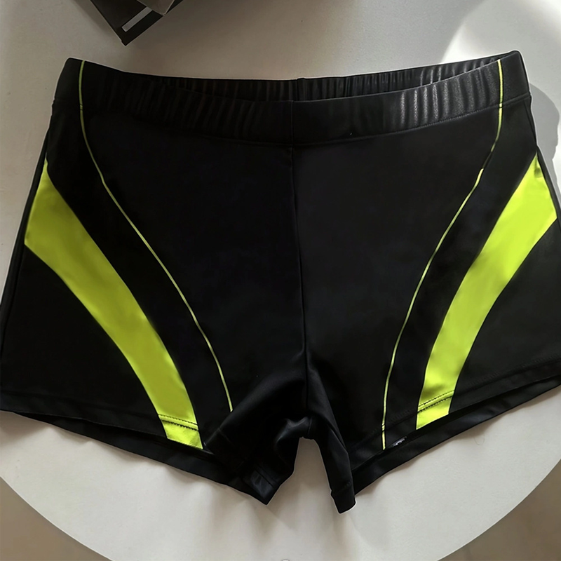 2024 Men's Clothing foreign trade new fashion black yellow color matching anti-exposure boxer men's swimming trunks manufacturer ready stock_voghion.com