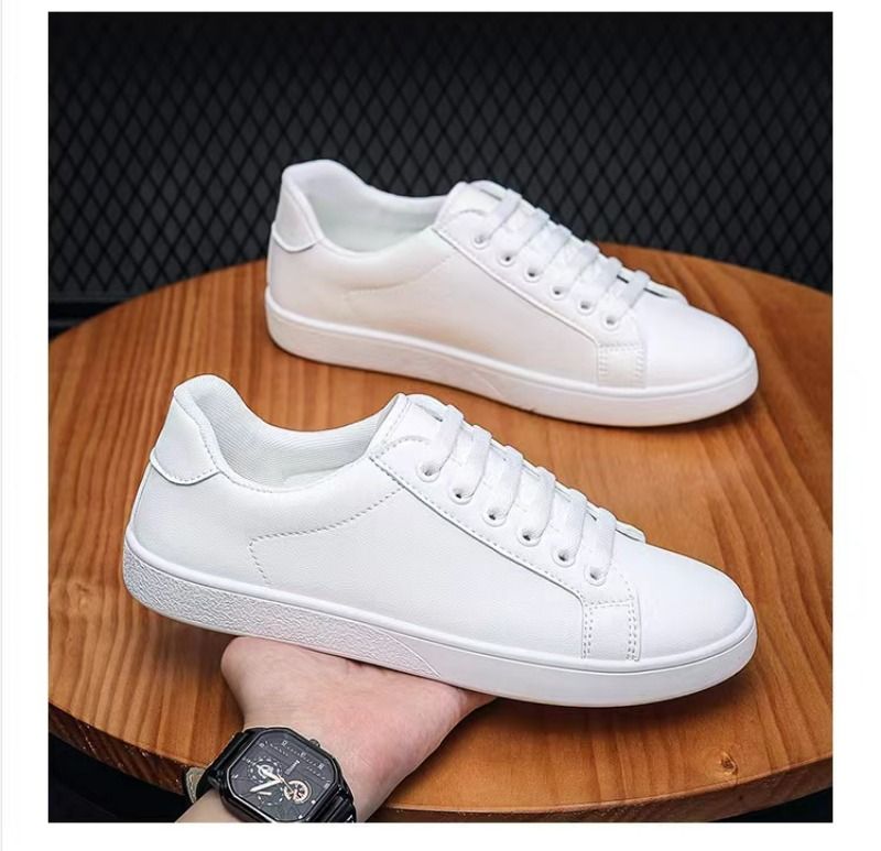 Uformell sport for menn Hvite mote flats 2024 Nye designersneakers Herre ensfargede tennissko Zapatillas Hombre_voghion.com