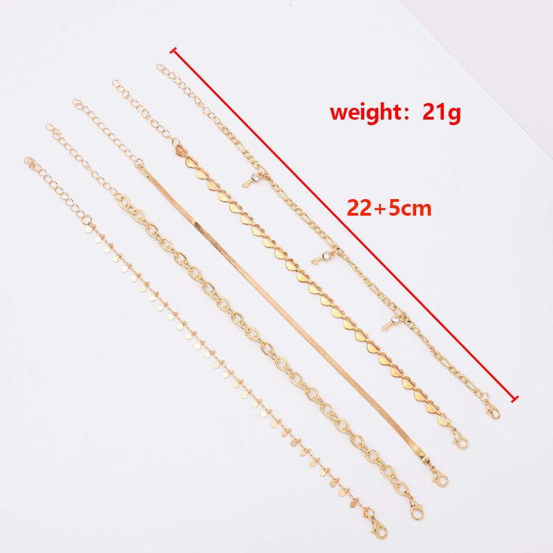 Tobillera de 5 piezas con colgante de borla y llave de diamantes incrustados con cadena de serpiente redonda de corazón hueco estilo punk_voghion.com